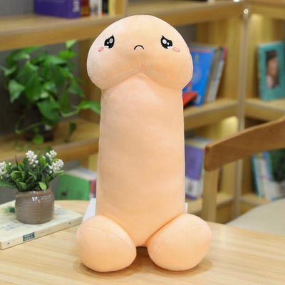 A pink penis stuffed pee pee that has a upside down smile and watery eyes due to sadness