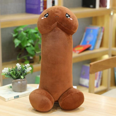 A brown pee pee that is a stuffed animal and has a sad face and crying eyes