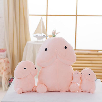 A collection of different sized pillows shaped like a dick