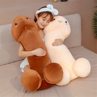 woman hugging a brown and a pink toy penis soft